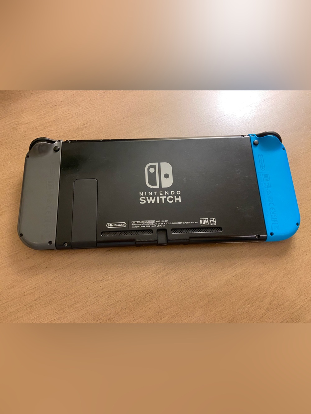 Nintendo Switch with Blue and Gray Joy-Con Controllers - Picture 2 of 9